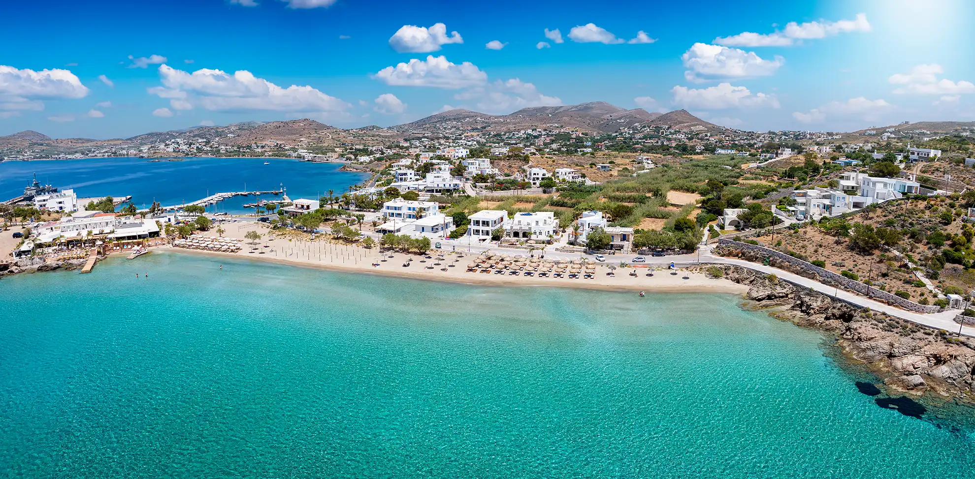 Panoramic aerial view of the popular and beautiful Agathopes beach, Syros island, Cyclades, Greece